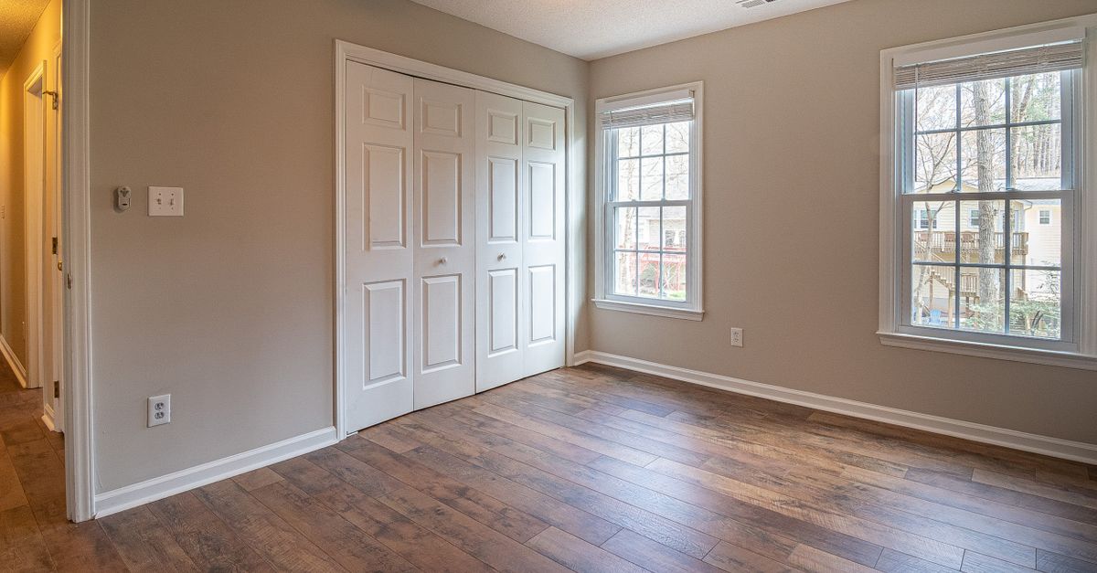 Modern apartment interior with contemporary tile and vinyl flooring design