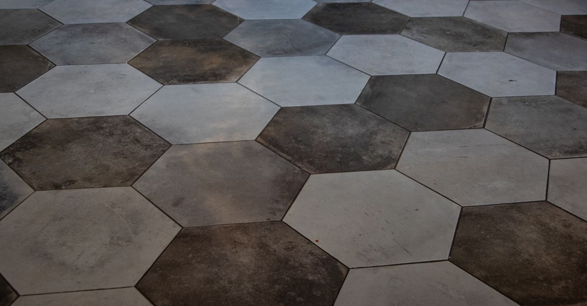 Vinyl floor installation with close-up of material and installation process